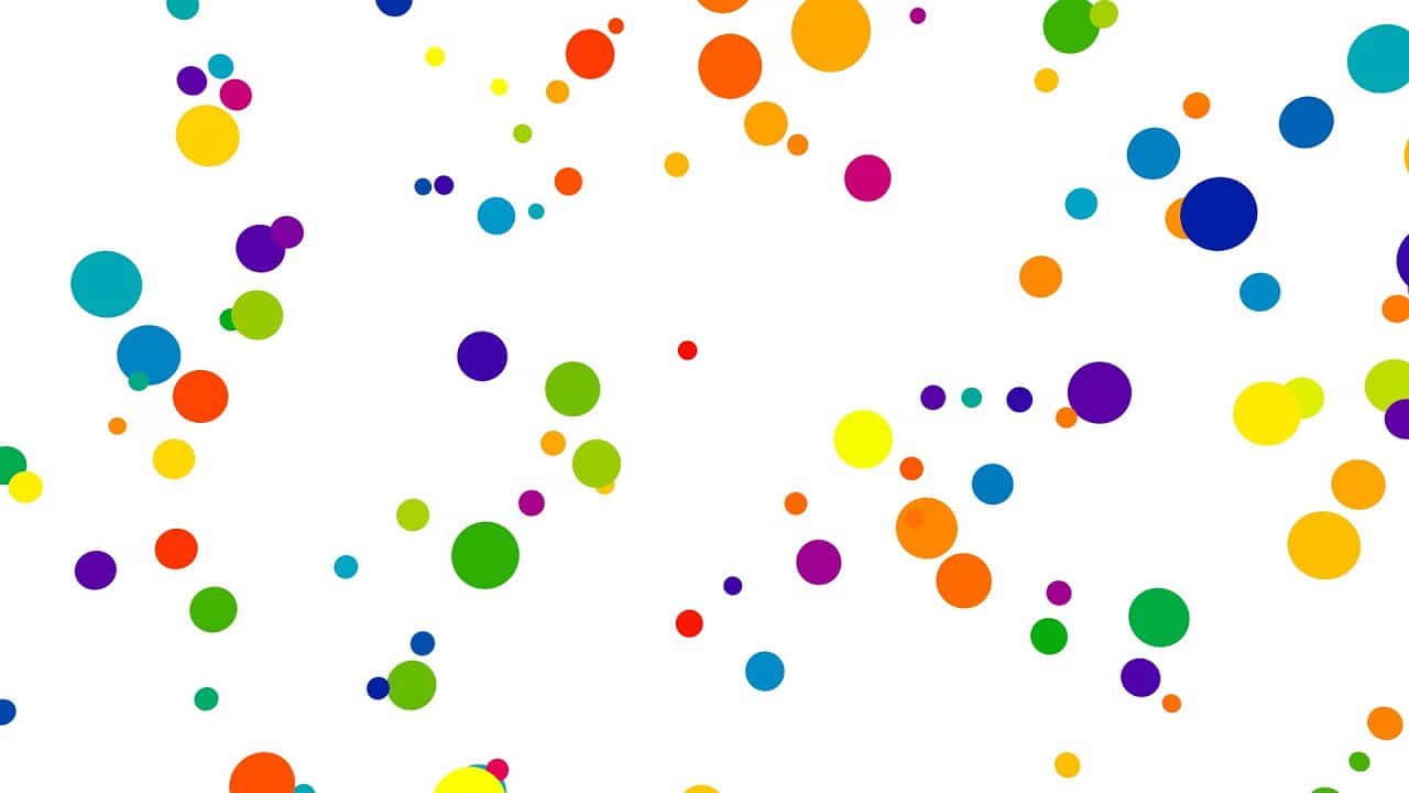 Polka Dot 桌布 壁紙 — 鮮豔的彩色圓圈隨機漂浮在潔白的背景上，營造出俏皮的抽象圖案。