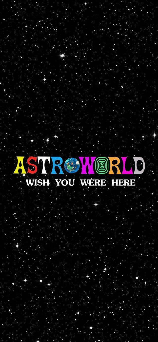 Astroworld 桌布 壁紙 — 鮮豔的彩虹文字寫著「ASTROWORLD WISH YOU WERE HERE」，漂浮在佈滿星星的黑色太空背景上。