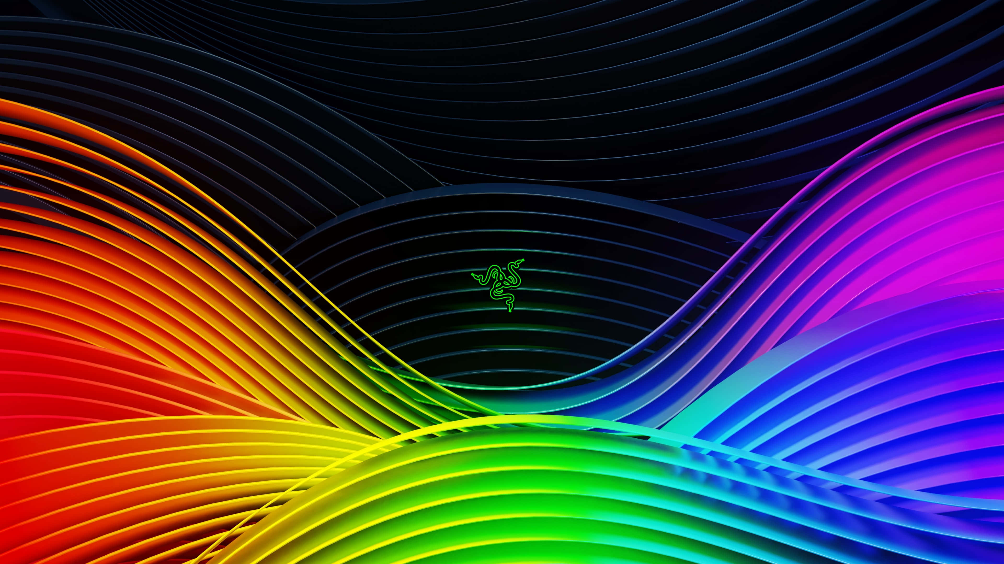 Colorful Gaming 桌布 壁紙 — 鮮豔的彩虹波浪在深色背景上動態流動，中央有發光的 Razer 標誌。