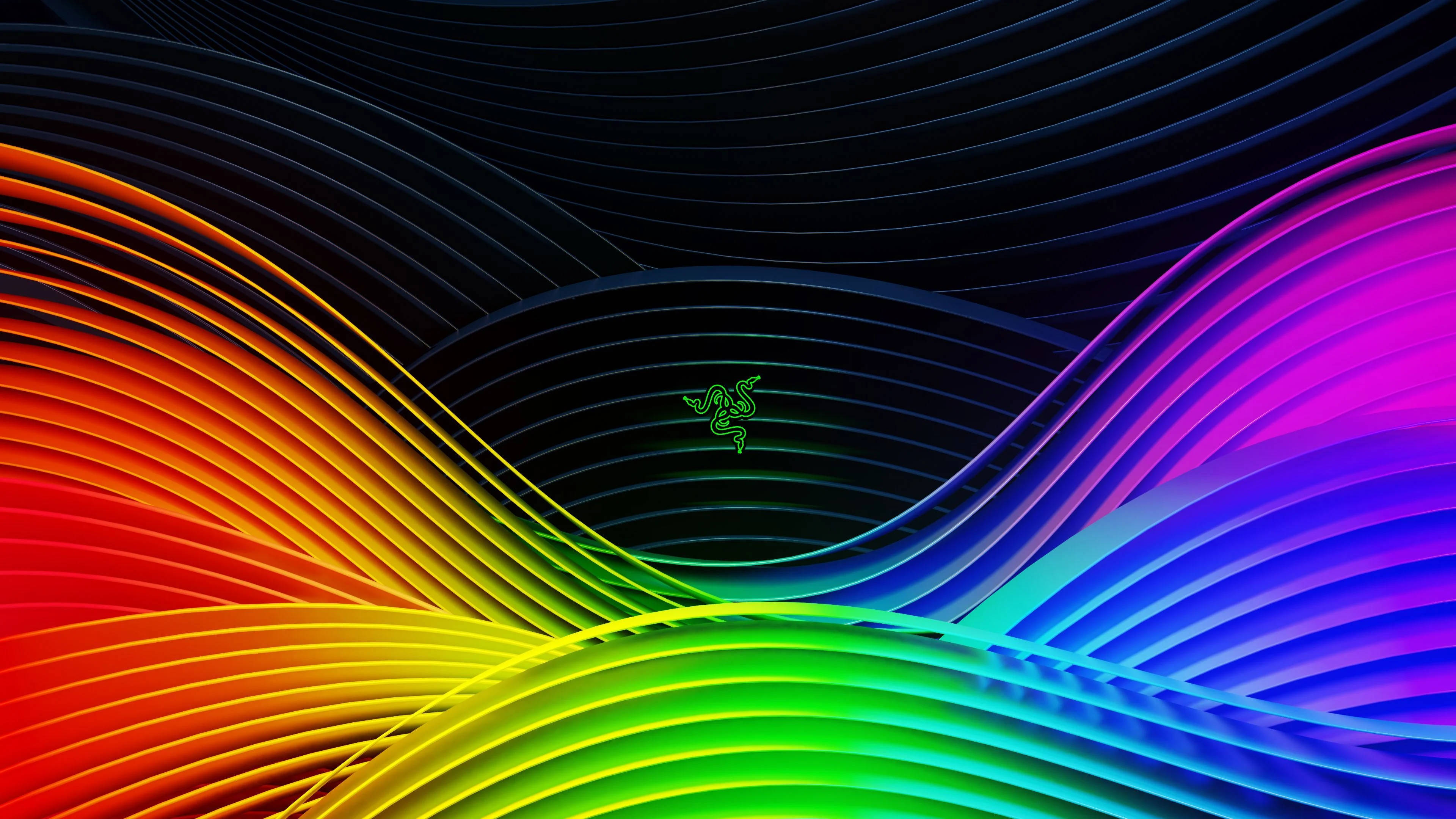 Logo 桌布 壁紙 — 鮮豔的彩虹波浪在深色背景上動態流動，中央有發光的Razer標誌。