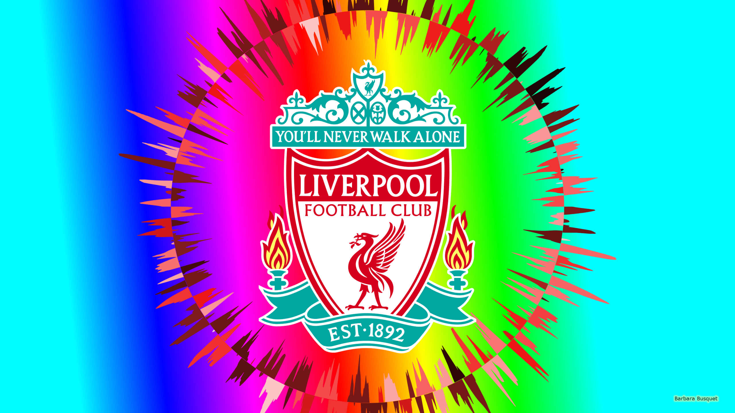 Liverpool Fc Desktop 桌布 壁紙 — 鮮豔的彩虹爆發在利物浦足球俱樂部標誌性的隊徽（紅色利物鳥和「You'll Never Walk Alone」格言）後方放射開來。