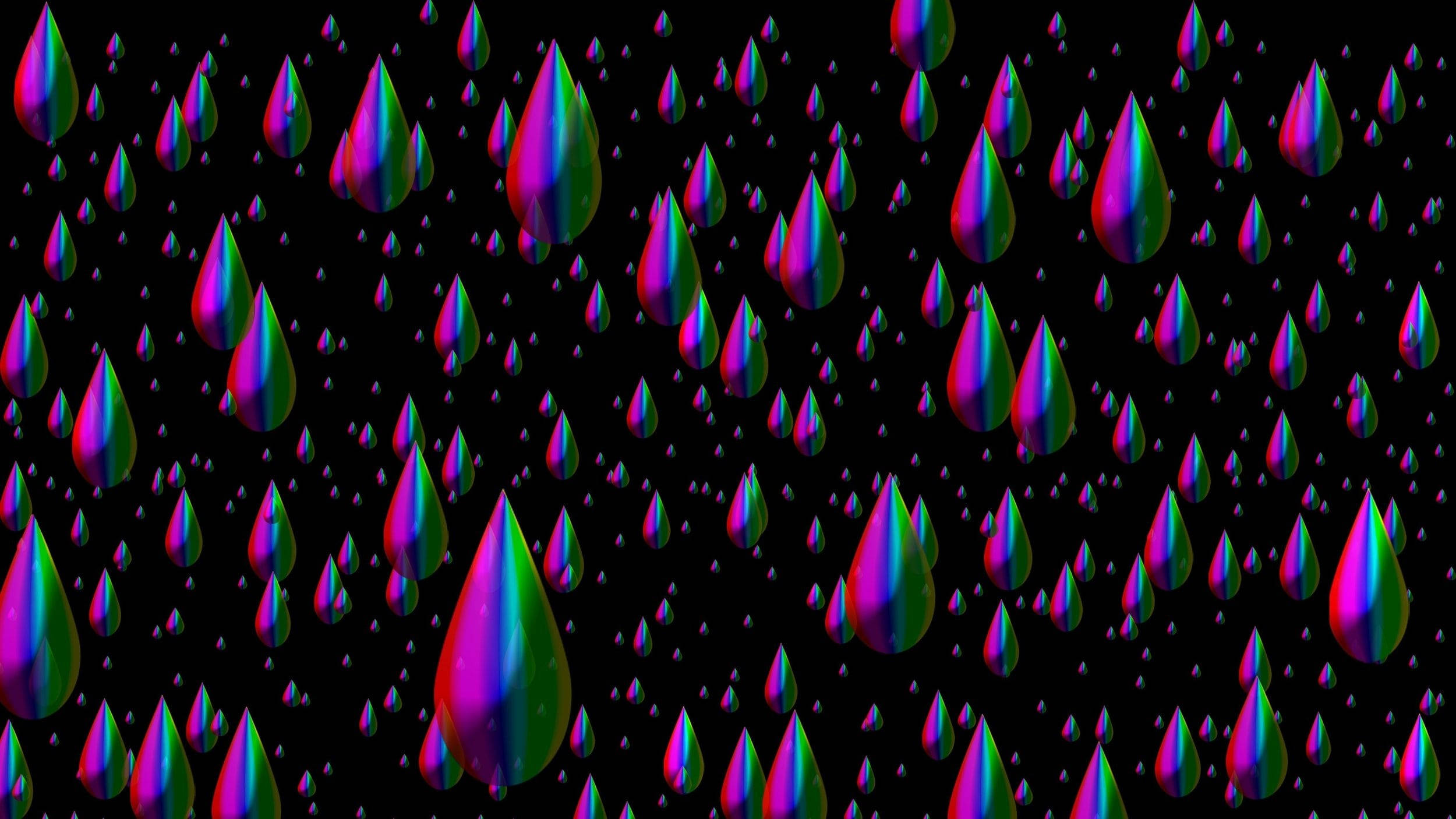 滴落感 桌布 壁紙 — 鮮豔的彩虹色雨滴在純黑背景上漂浮，形成迷人的數位圖案。