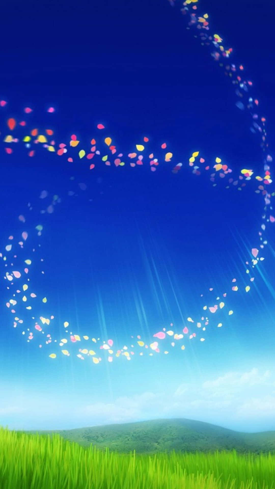 Galaxy S5 桌布 壁紙 — 鮮豔的彩虹花瓣在深藍色的天空中，在茂密的綠色田野上方形成發光的螺旋。
