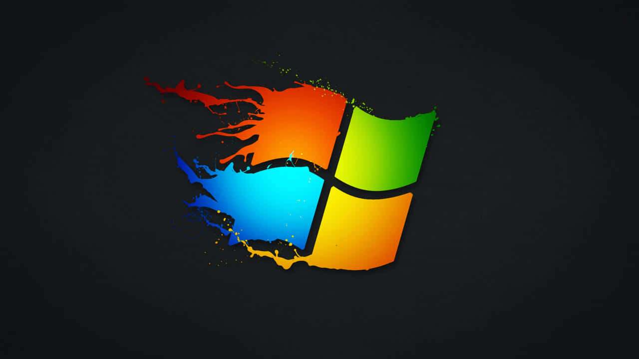 Windows XP 桌布 壁紙 — 鮮豔的油漆飛濺在深色背景上形成標誌性的Windows標誌。