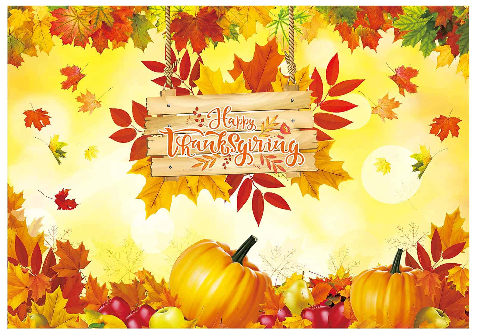 節日 桌布 壁紙 — 鮮豔的秋葉和南瓜環繞著一個木牌，上面寫著「Happy Thanksgiving」，背景是金色的陽光。