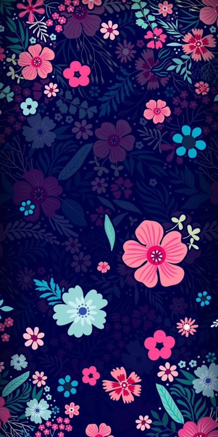 WhatsApp 聊天 桌布 壁紙 — 鮮豔的粉紅色、藍綠色和紫色花朵在深海軍藍背景上綻放，形成色彩繽紛的數位花卉圖案。