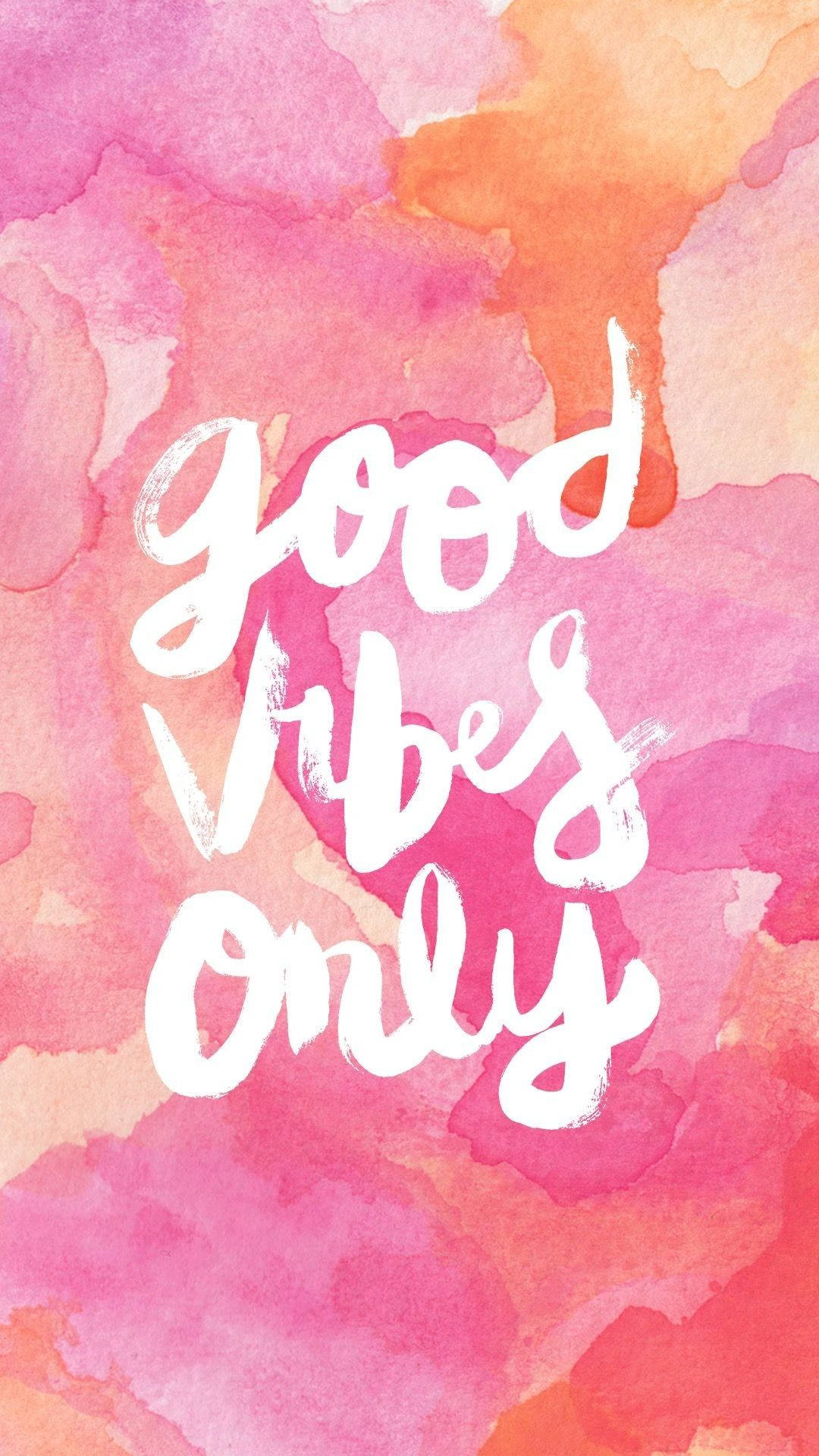 粉紅色和橙色水彩背景上白色手寫字 good vibes only