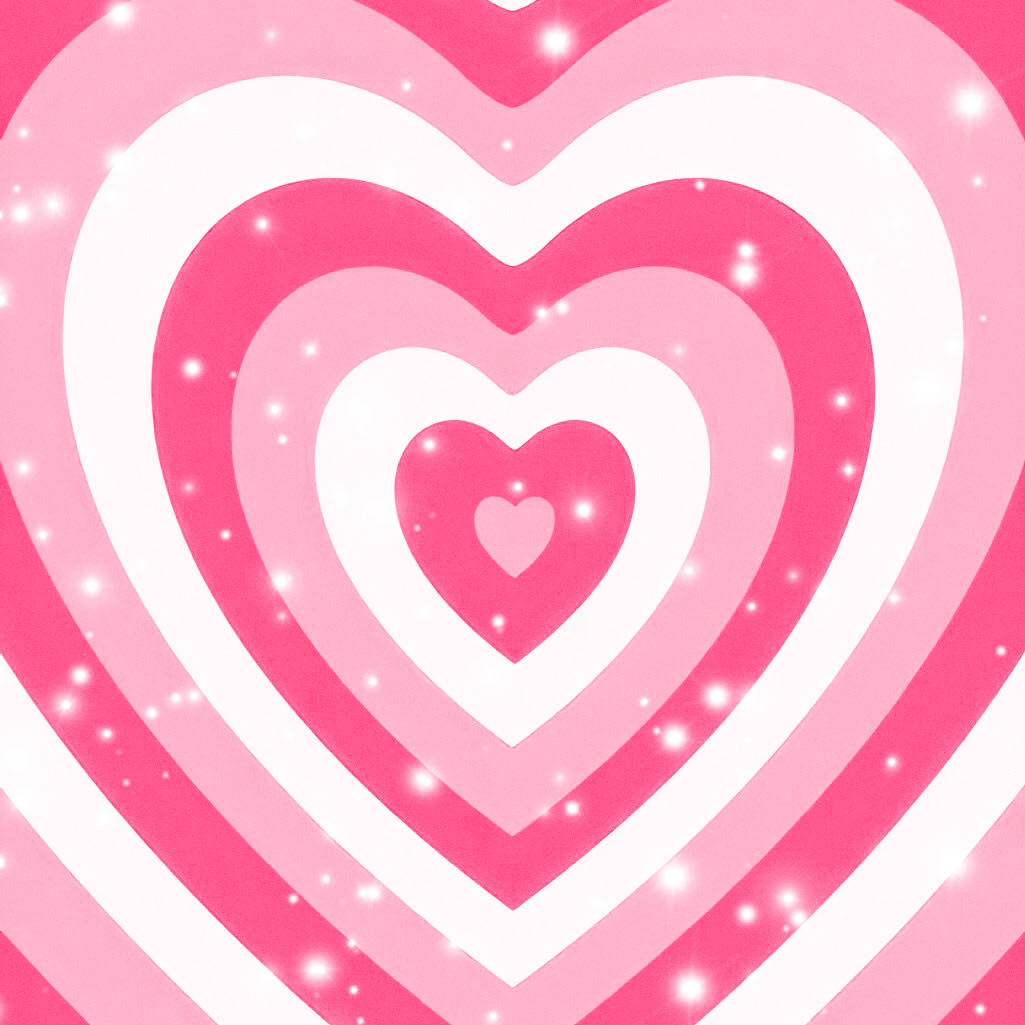 Y2k Heart 桌布 壁紙 — 鮮豔的粉紅色和白色同心心形在柔和的漸變背景上散發閃爍的亮片光芒。
