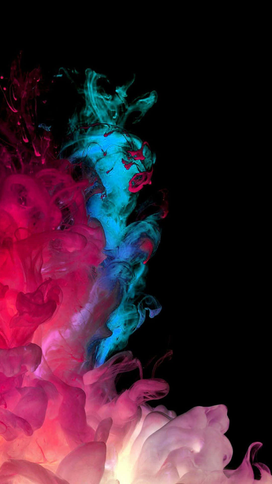 AMOLED 4K 桌布 壁紙 — 鮮豔的粉紅色和青色墨水漩渦在純黑色背景上爆炸，形成動態的抽象爆發。