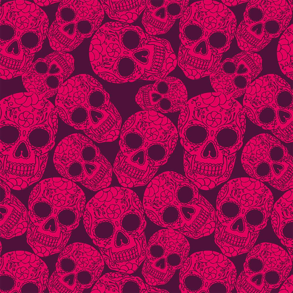 Pink Skull 桌布 壁紙 — 鮮豔的粉紅色糖骷髏頭搭配花卉圖案，在深紫色背景上重複形成無縫圖案。