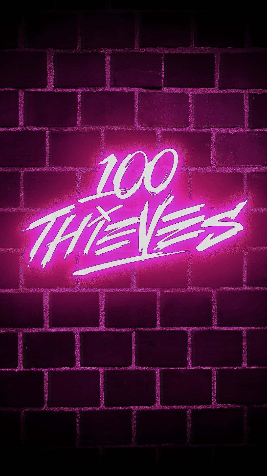 100 Thieves 桌布 壁紙 — 鮮豔的粉紅色霓虹燈牌寫著 100 THIEVES，在黑暗的磚牆上發光，營造出粗獷的城市氛圍。