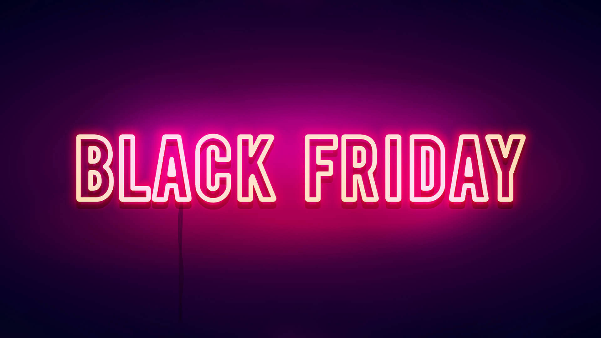 Friday 桌布 壁紙 — 鮮豔的粉紅色霓虹燈牌寫著 BLACK FRIDAY，在深紫色漸層牆上發光。