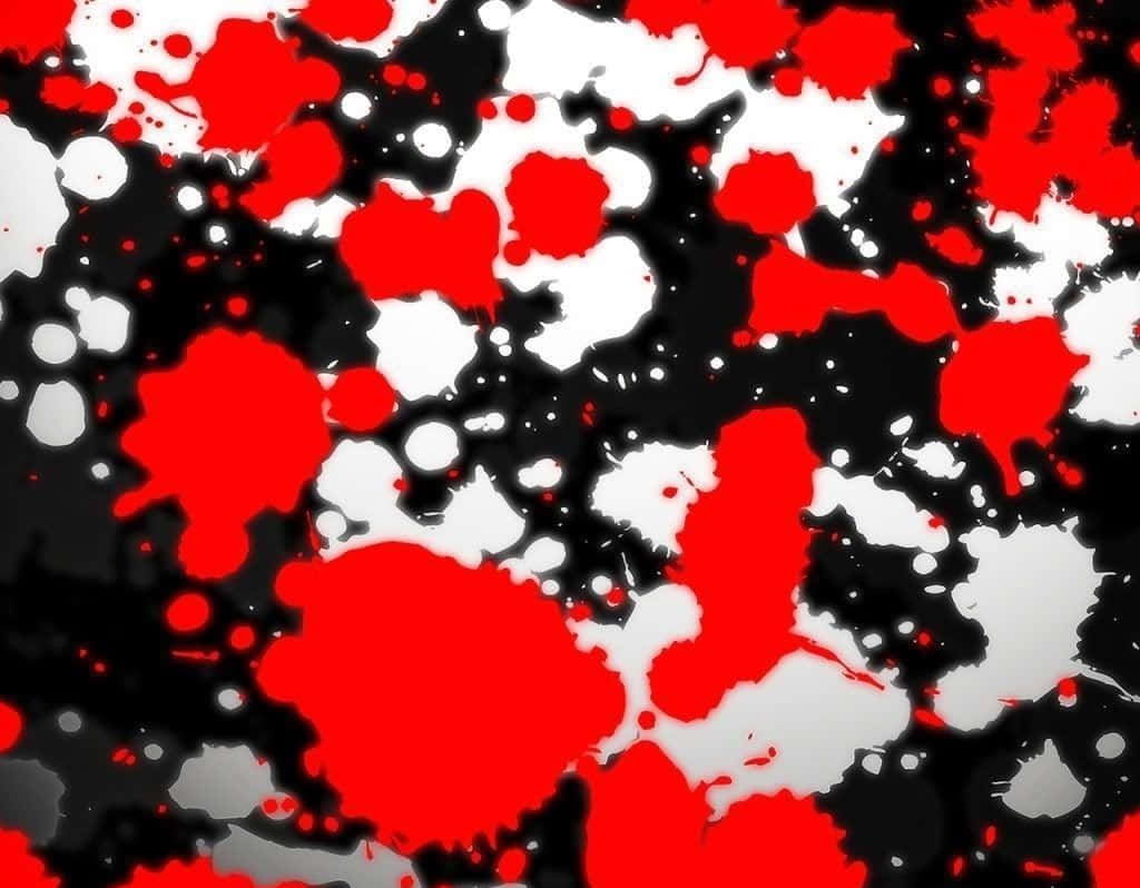 Red Black And White 桌布 壁紙 — 鮮豔的紅色、白色和黑色油漆飛濺創造出混亂而充滿活力的抽象構圖。