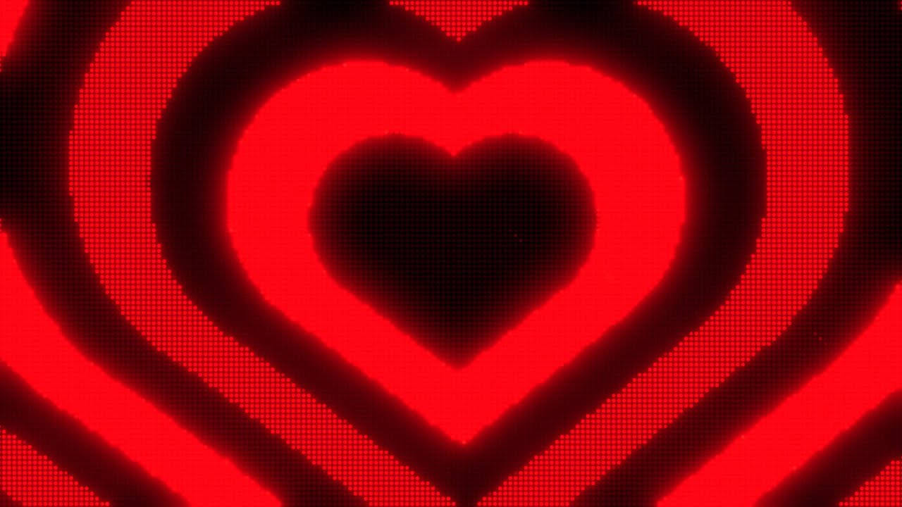 Y2k Heart 桌布 壁紙 — 鮮豔的紅色像素心形在深色背景上以同心層發光。