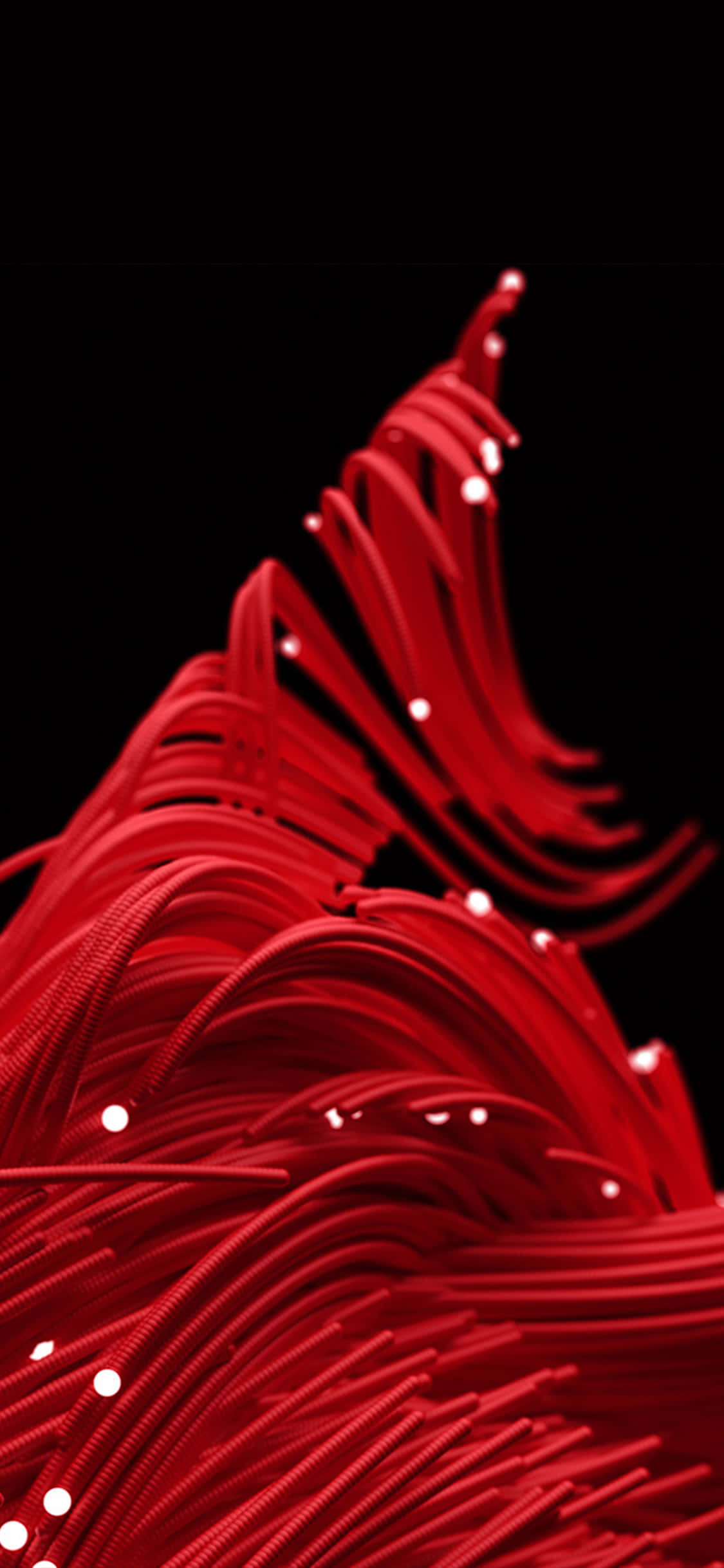 Red Christmas iPhone 桌布 壁紙 — 鮮豔的紅色光纖絲在漆黑的背景上發出明亮的白色光點。