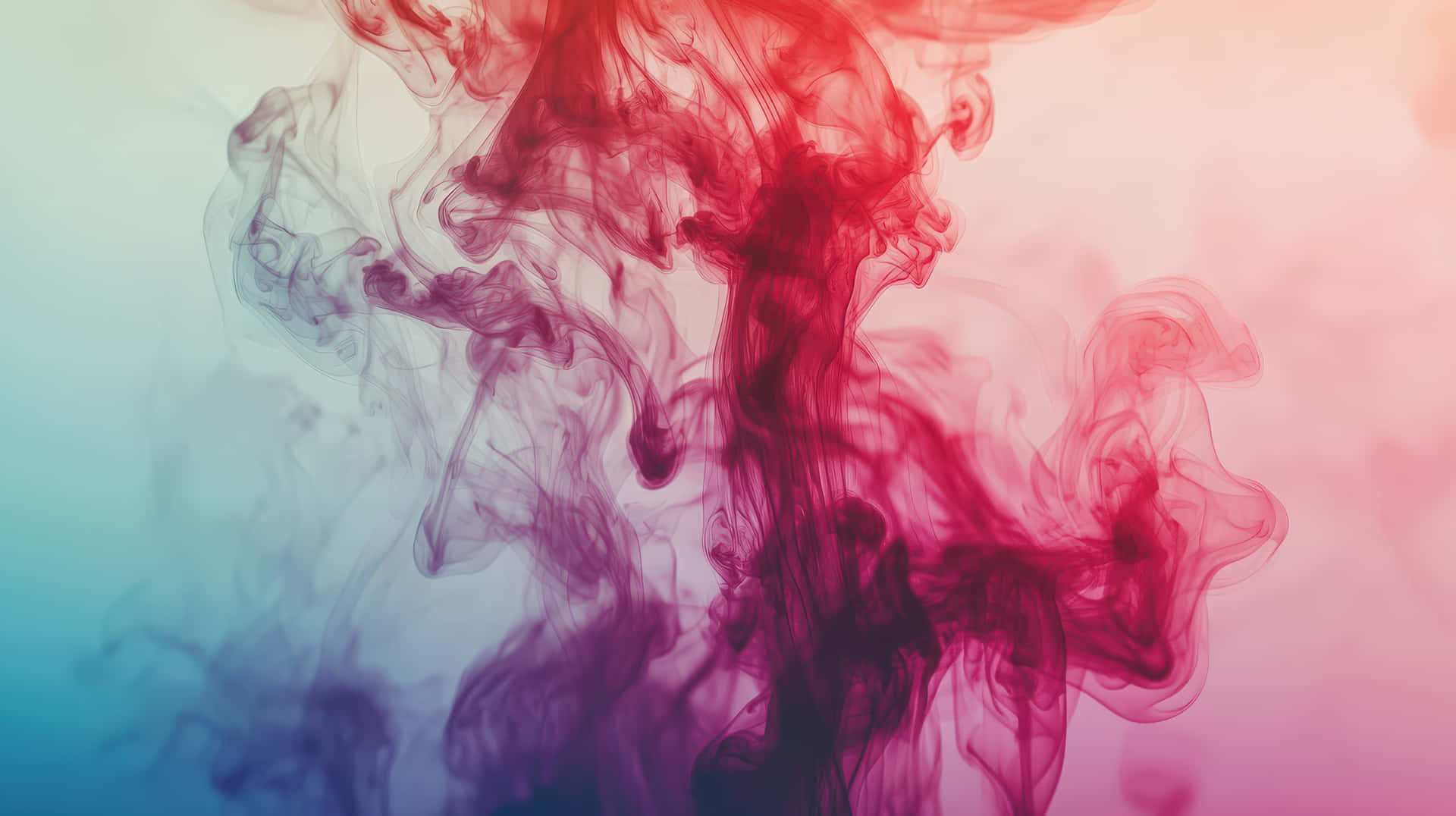 Colorful Ink Smoke Swirling in Abstract Motion 壁紙 — 鮮豔的紅色和藍綠色墨水優雅地旋轉在柔和的漸變背景上，創造出動態的抽象構圖。