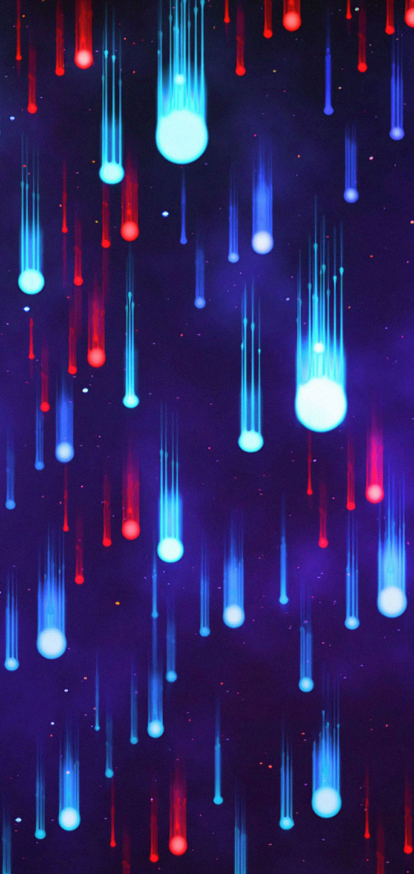 Galaxy S10 桌布 壁紙 — 鮮豔的紅色和藍色流星對角線劃過深紫色星空夜空。