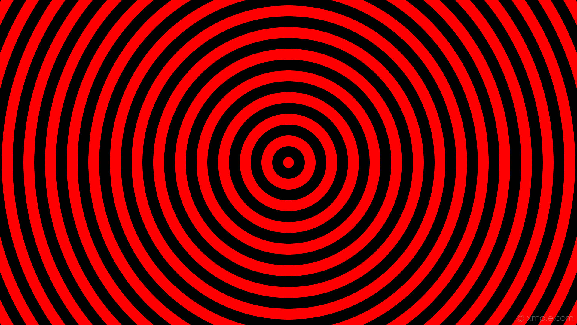 Red Circle 桌布 壁紙 — 鮮豔的紅色和黑色同心圓創造出一種催眠般的視錯覺，將視線向內吸引。