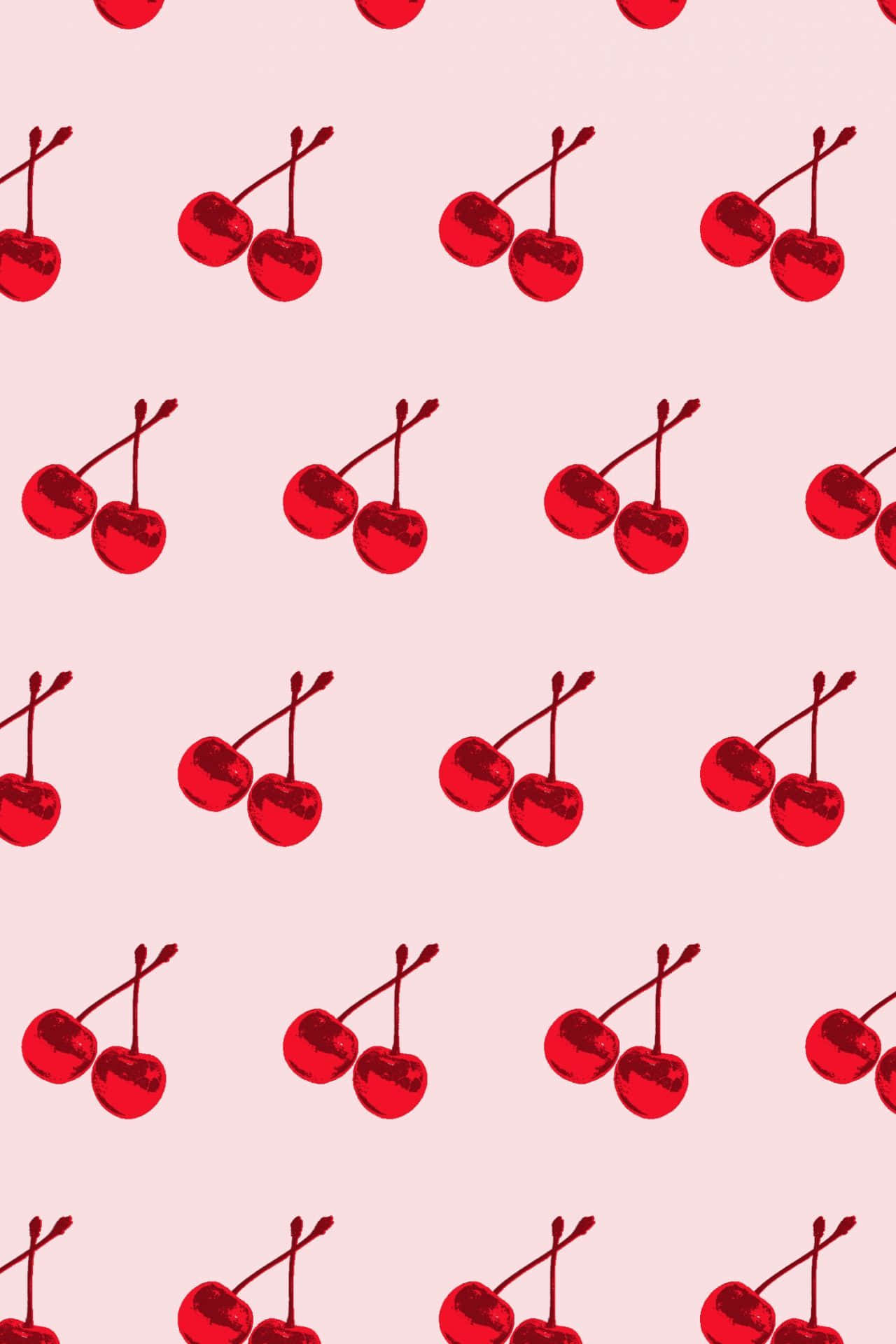 Cherry Aesthetic 桌布 壁紙 — 鮮豔的紅色櫻桃成對重複出現在柔和的粉紅色背景上，形成乾淨的幾何圖案。