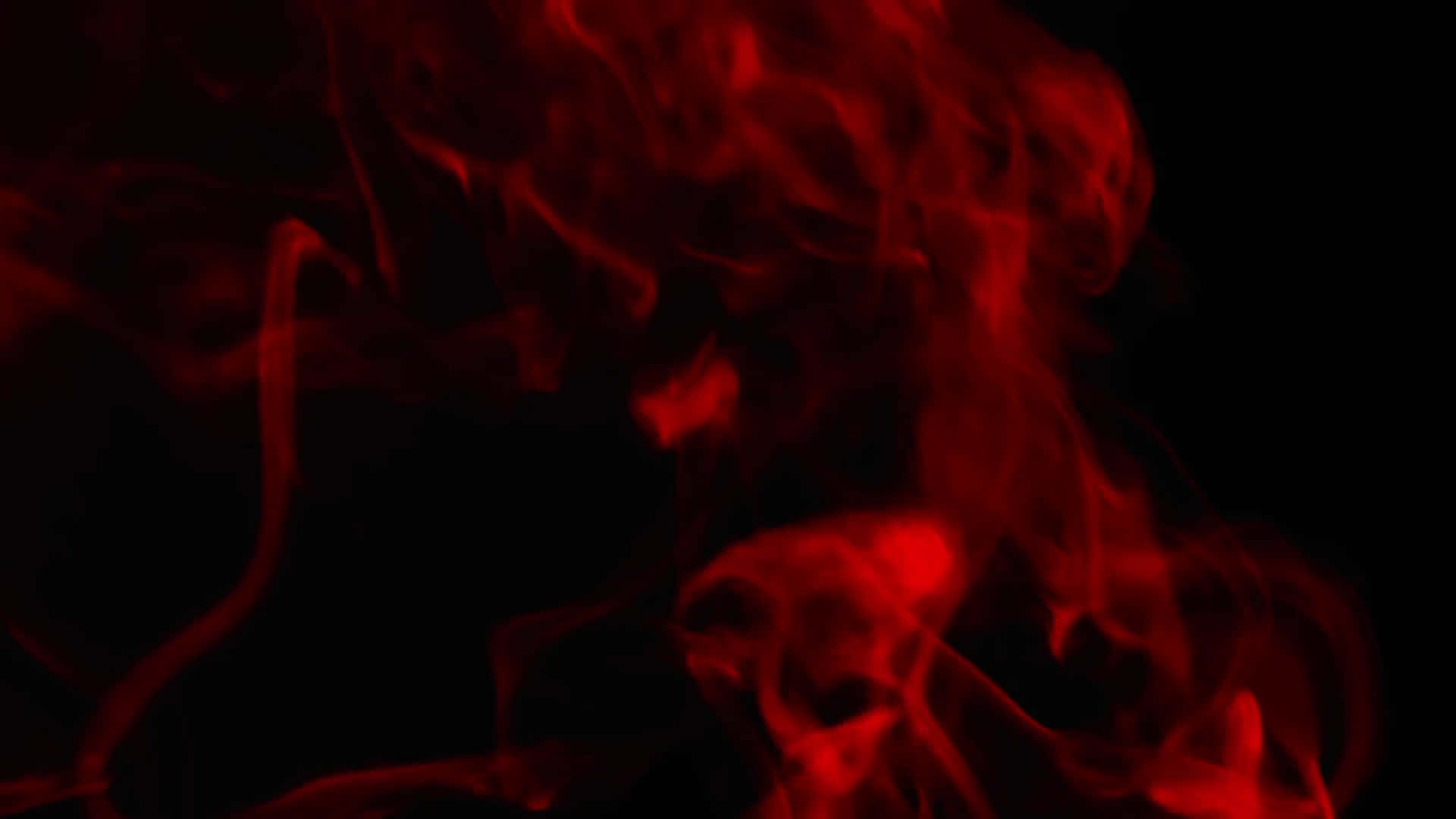 Red Smoke Effect 桌布 壁紙 — 鮮豔的紅色煙霧在純黑色背景上動態旋轉，營造出強烈的抽象運動。