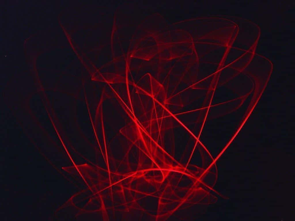 Red Neon 桌布 壁紙 — 鮮豔的紅色雷射光軌在深黑色背景上動態旋轉，形成抽象且充滿活力的圖案。