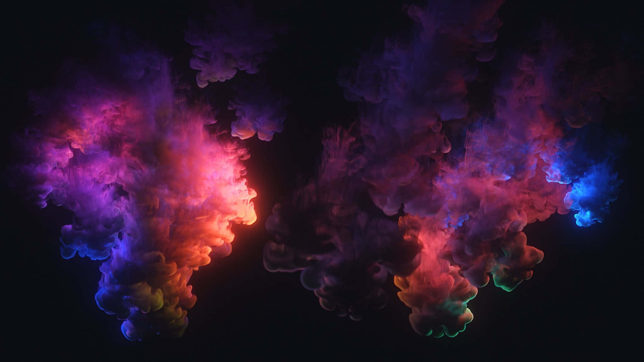 Color Smoke 桌布 壁紙 — 鮮豔的霓虹墨水雲在漆黑虛空中以宇宙色調旋轉，營造出超凡脫俗的抽象景象。