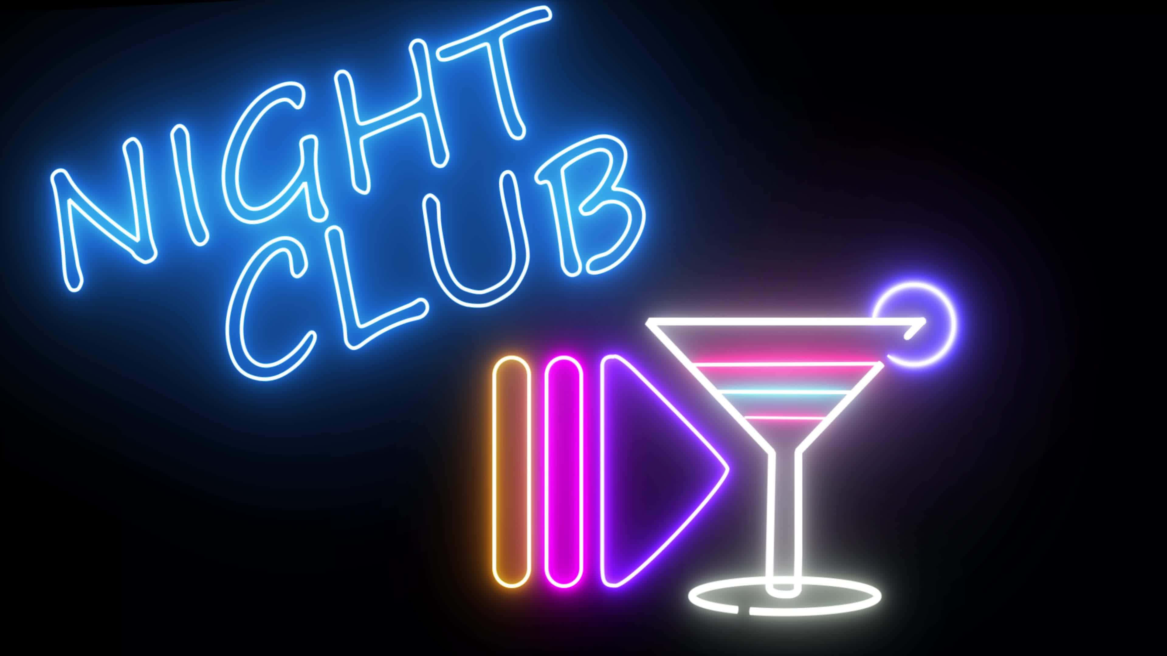 Nightclub 桌布 壁紙 — 鮮豔的霓虹燈招牌在黑暗背景中發出「NIGHT CLUB」文字和雞尾酒杯的光芒。