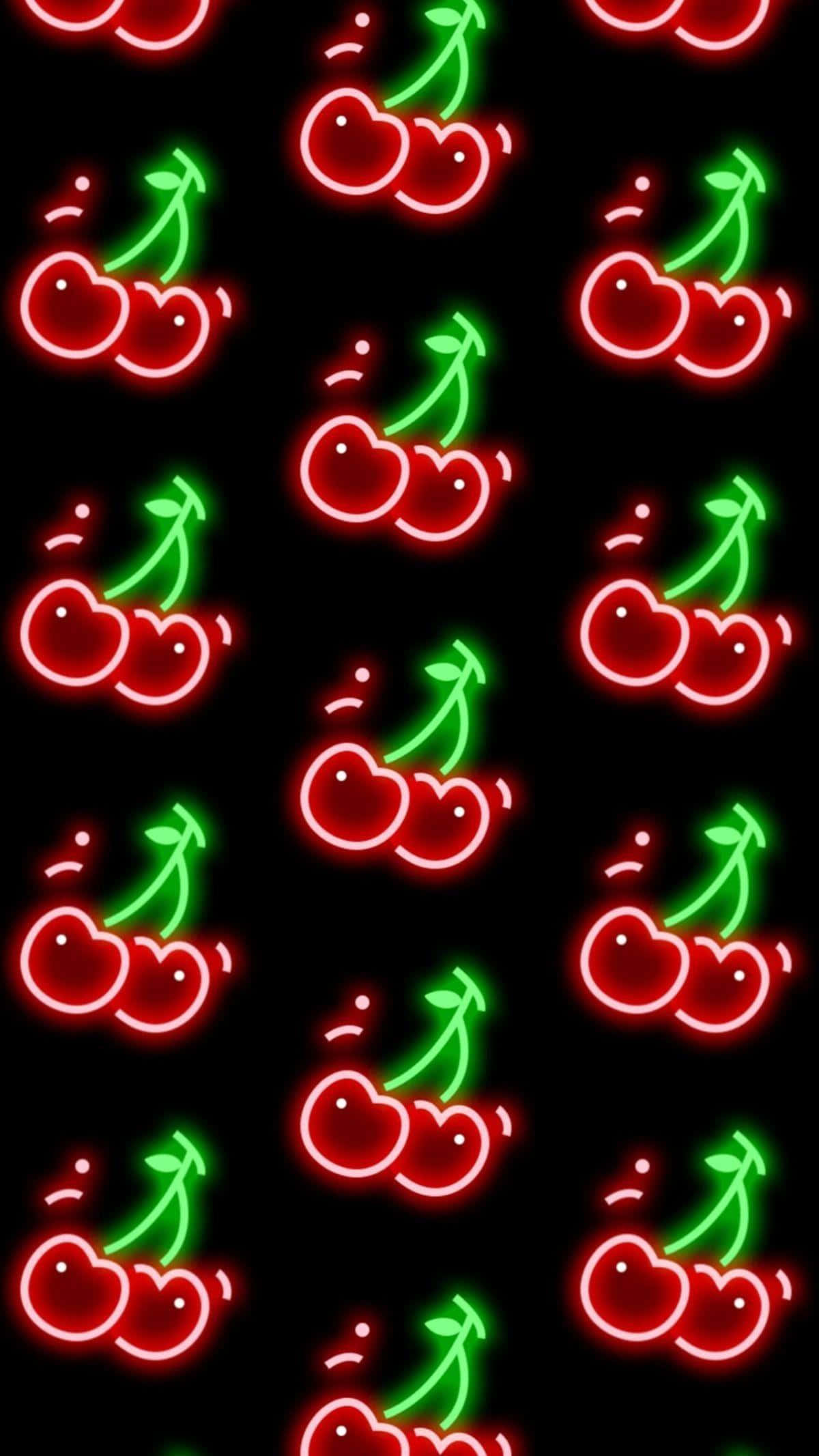 iPhone 桌布 壁紙 — 鮮豔的霓虹紅色和綠色櫻桃在黑色背景上以重複圖案發光。