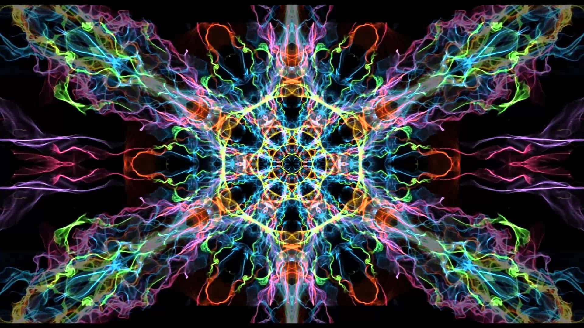 Trippy Fractals 桌布 壁紙 — 鮮豔的霓虹色碎形圖案從中央幾何核心向外輻射，襯托黑色虛空。