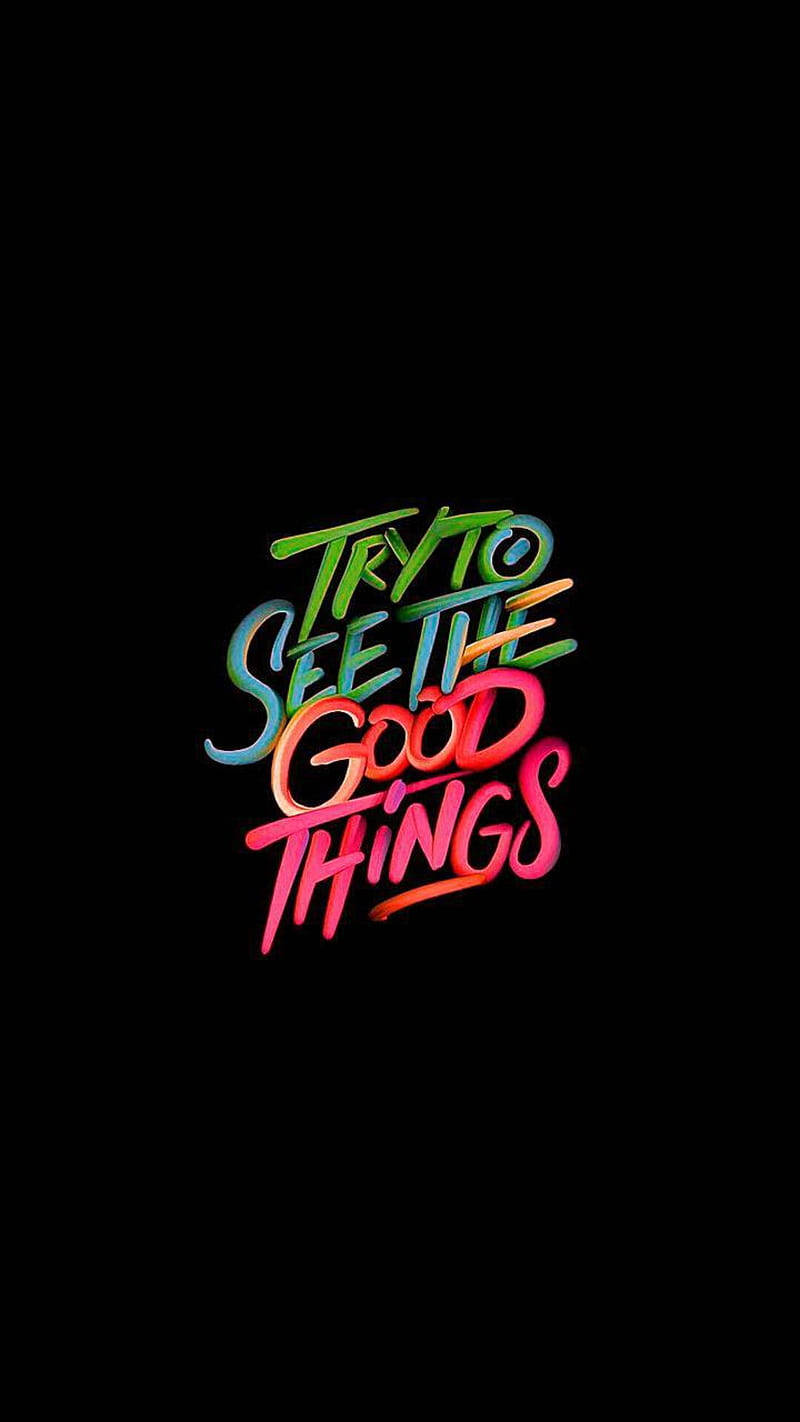 在黑色背景上發光的霓虹文字，寫著 try to see the good things — 深色引言 壁紙