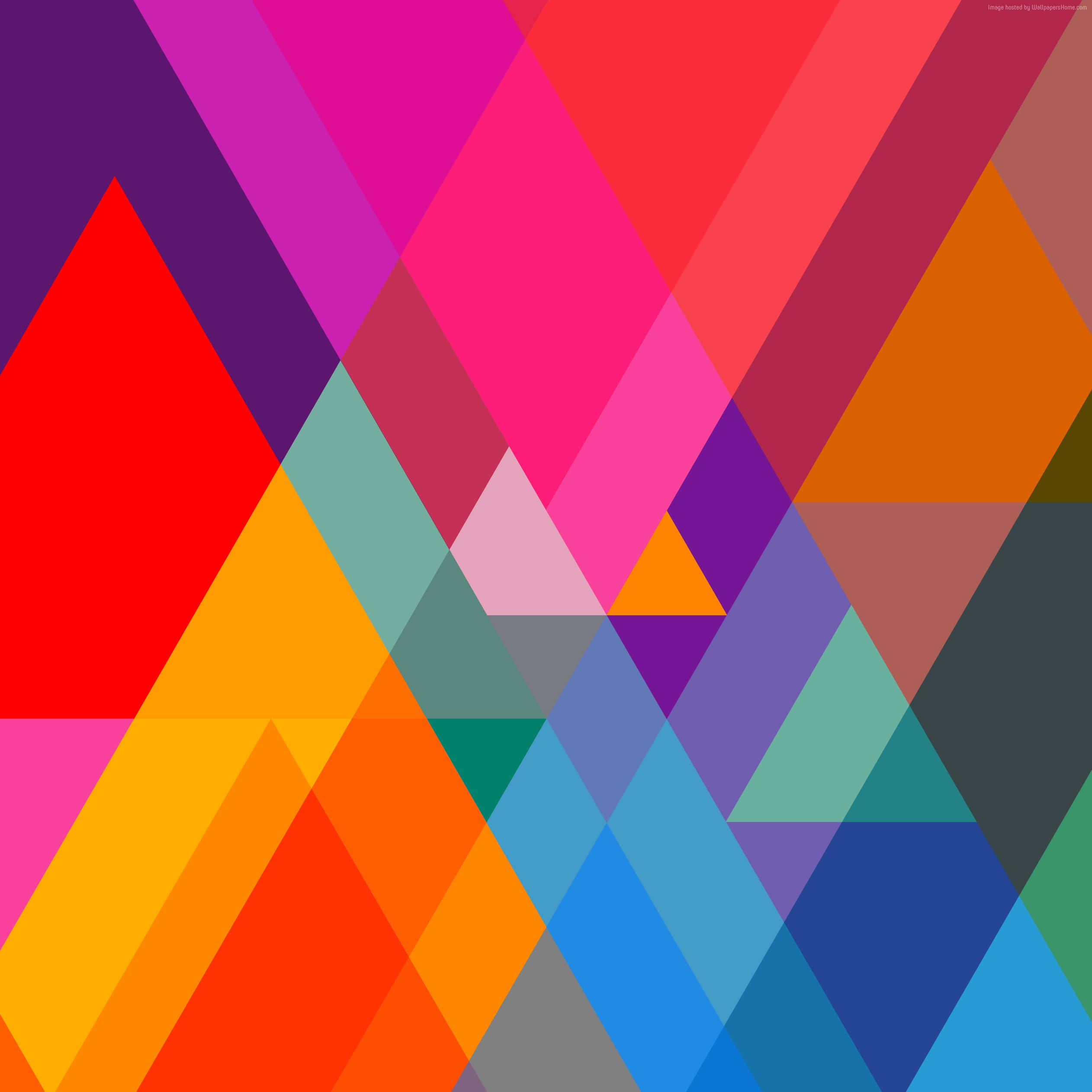 Geometric iPhone 桌布 壁紙 — 鮮豔重疊的三角形以鮮明的彩虹色調創造出動態的抽象幾何圖案。