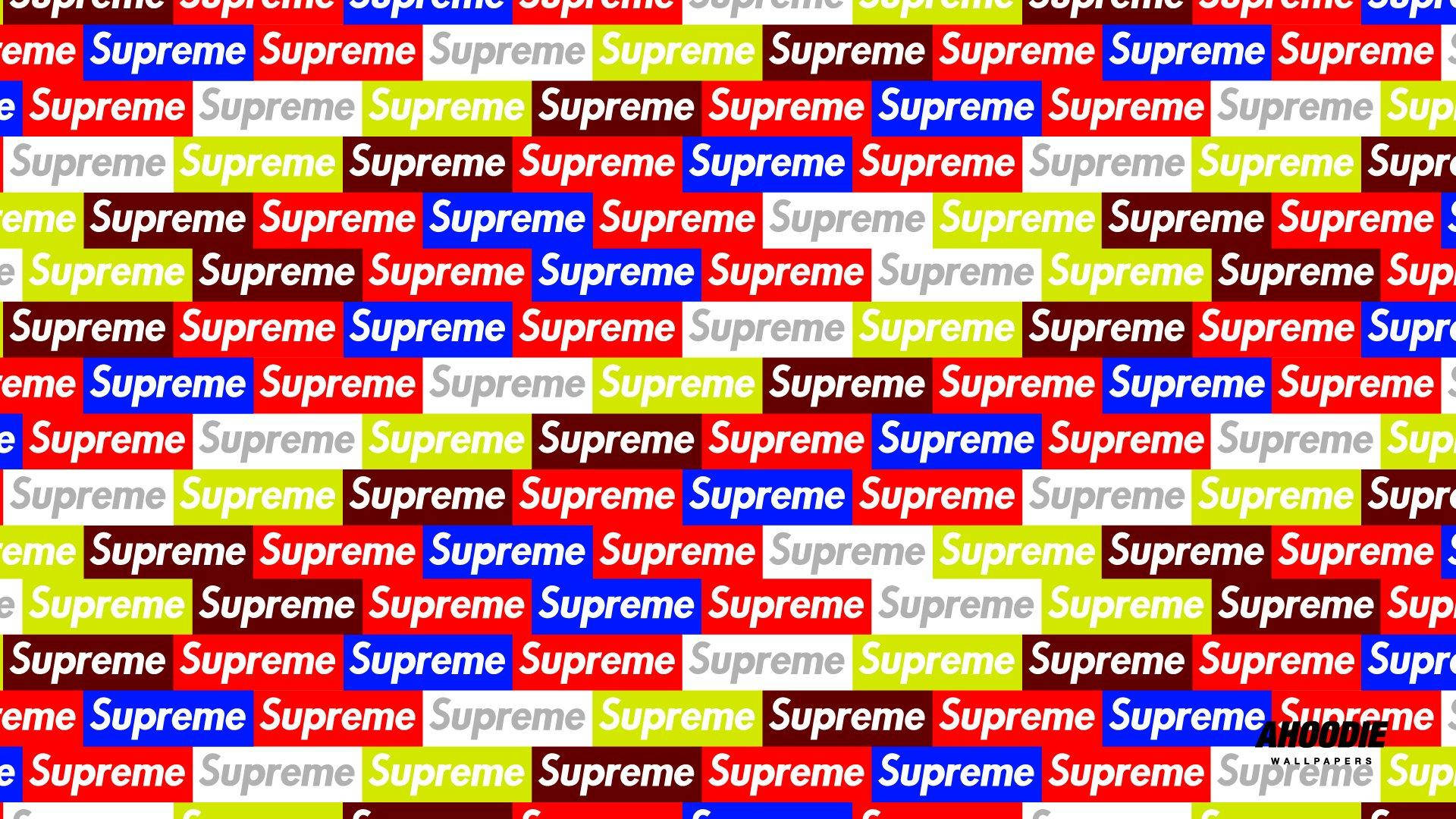 supreme 桌布 壁紙 — 鮮豔重複的Supreme標誌，以鮮明的紅色、藍色、綠色和白色，創造出高能量的塗鴉風格圖案。