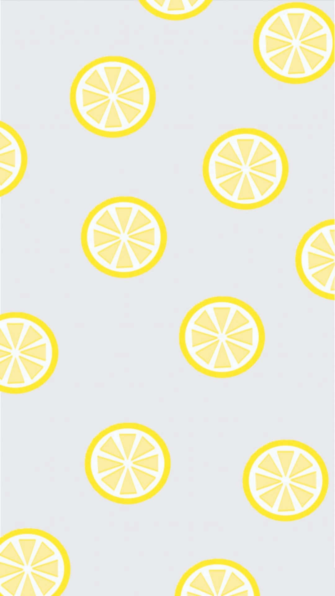 桌布 壁紙 — 鮮黃色的檸檬片在柔和的灰色背景上以俏皮的散落圖案漂浮。