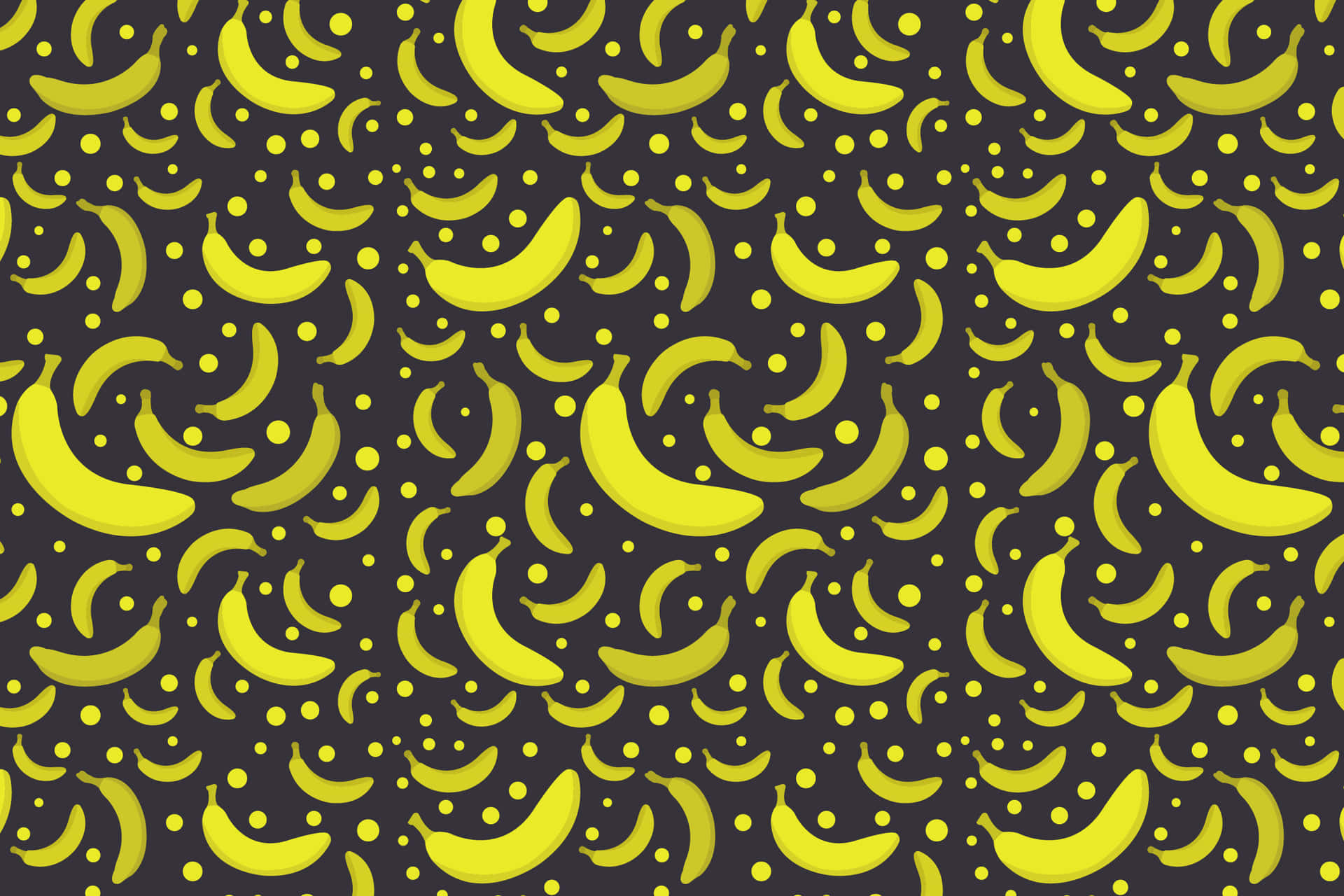 Banana Pattern 壁紙 — 鮮黃色的香蕉以不同方向重複排列在深灰色背景上，並帶有散落的圓點。