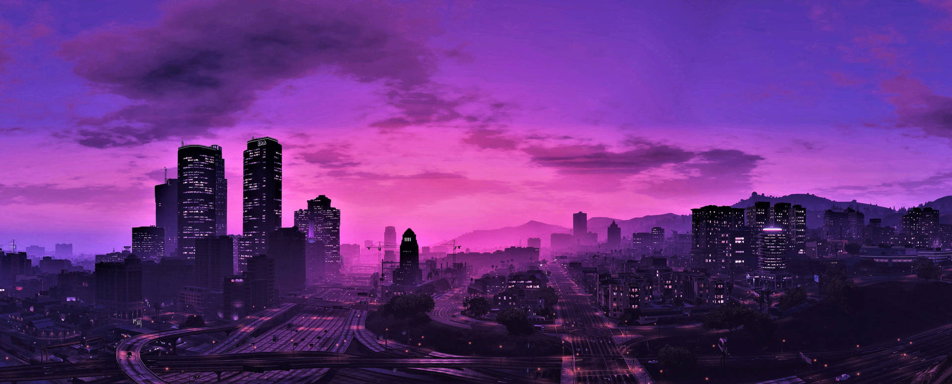 黃昏時分的城市天際線，天空呈現紫色和粉紅色，燈光閃爍。 — GTA 5 動圖 壁紙