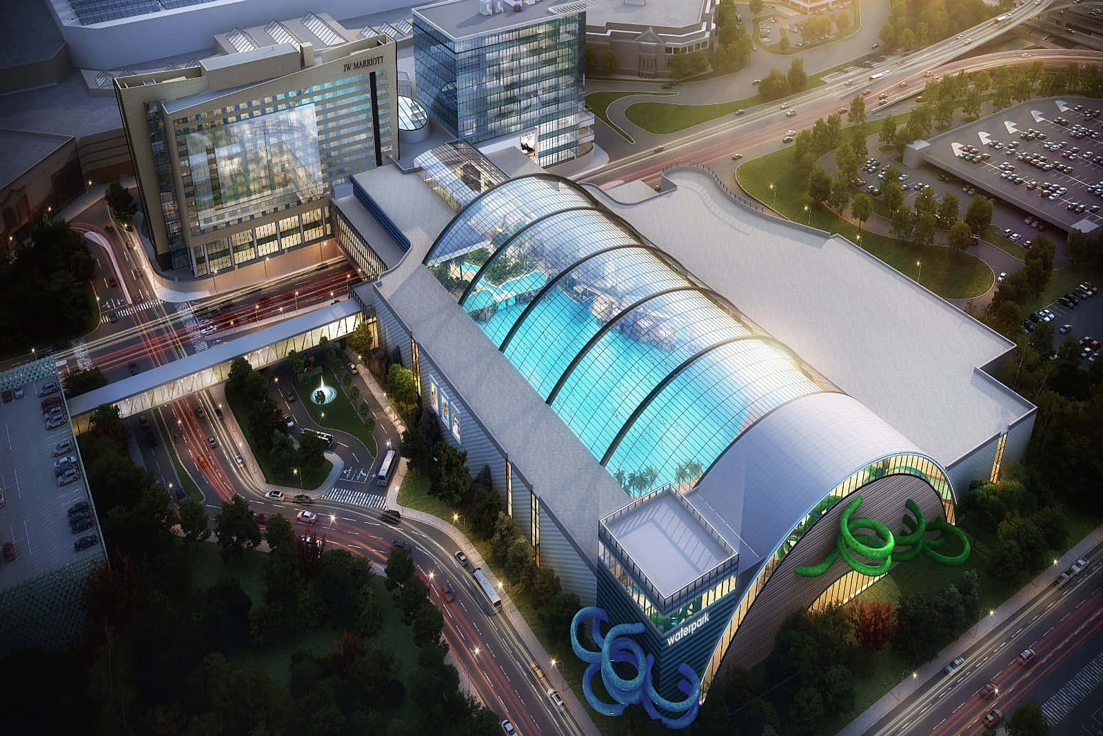Mall Of America 桌布 壁紙 — 黃昏時分，現代化會議中心的玻璃圓頂屋頂及周邊城市基礎設施的鳥瞰圖。