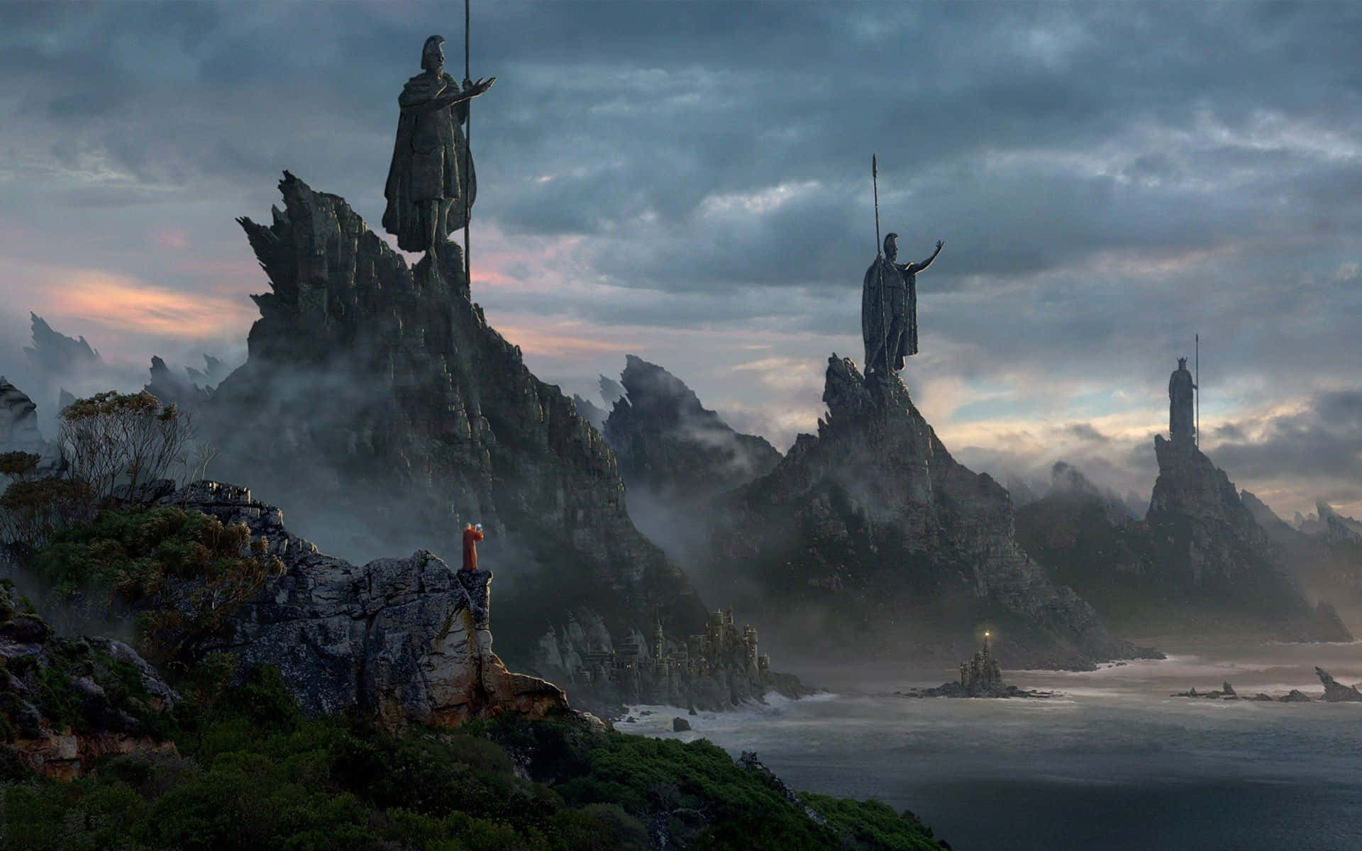 Lotr 桌布 壁紙 — 黃昏時分，身穿盔甲的巨型雕像矗立在崎嶇的懸崖上，俯瞰著霧氣瀰漫的海洋。