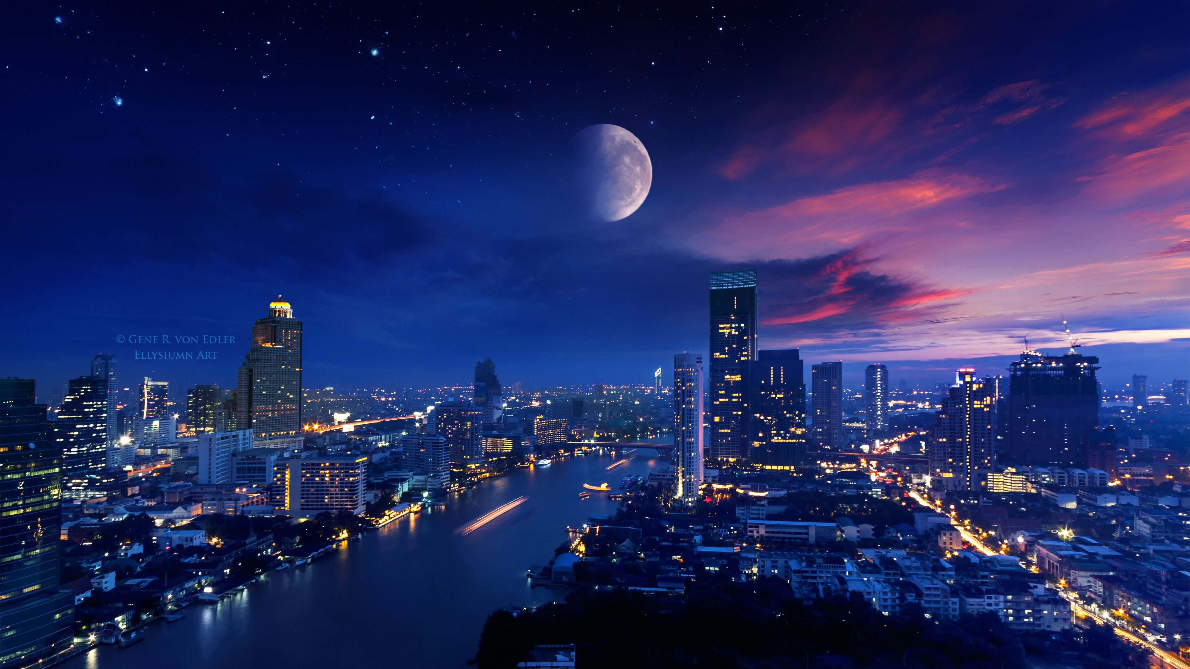 City Lights 桌布 壁紙 — 黃昏時分充滿活力的城市景觀，發光的彎月和星空照耀著燈火通明的摩天大樓和河流。