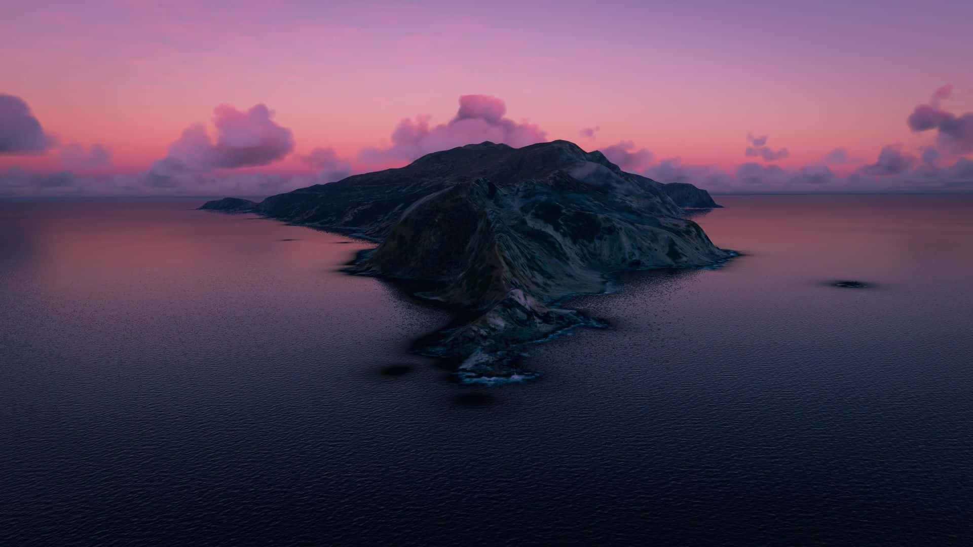 macOS Big Sur 動態桌布 桌布 壁紙 — 黃昏時分崎嶇火山島的鳥瞰圖，粉紫色天空倒映在平靜的海面上。