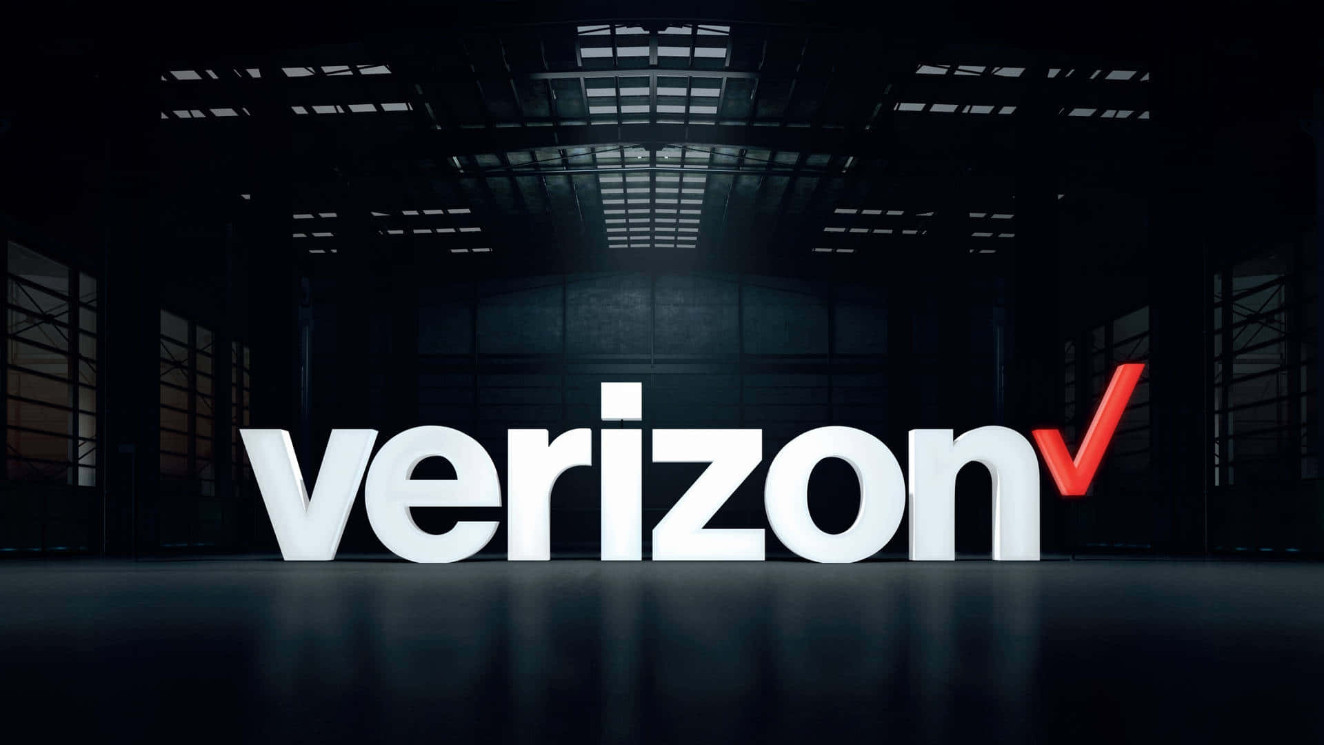 黑暗倉庫中的Verizon V標誌 壁紙