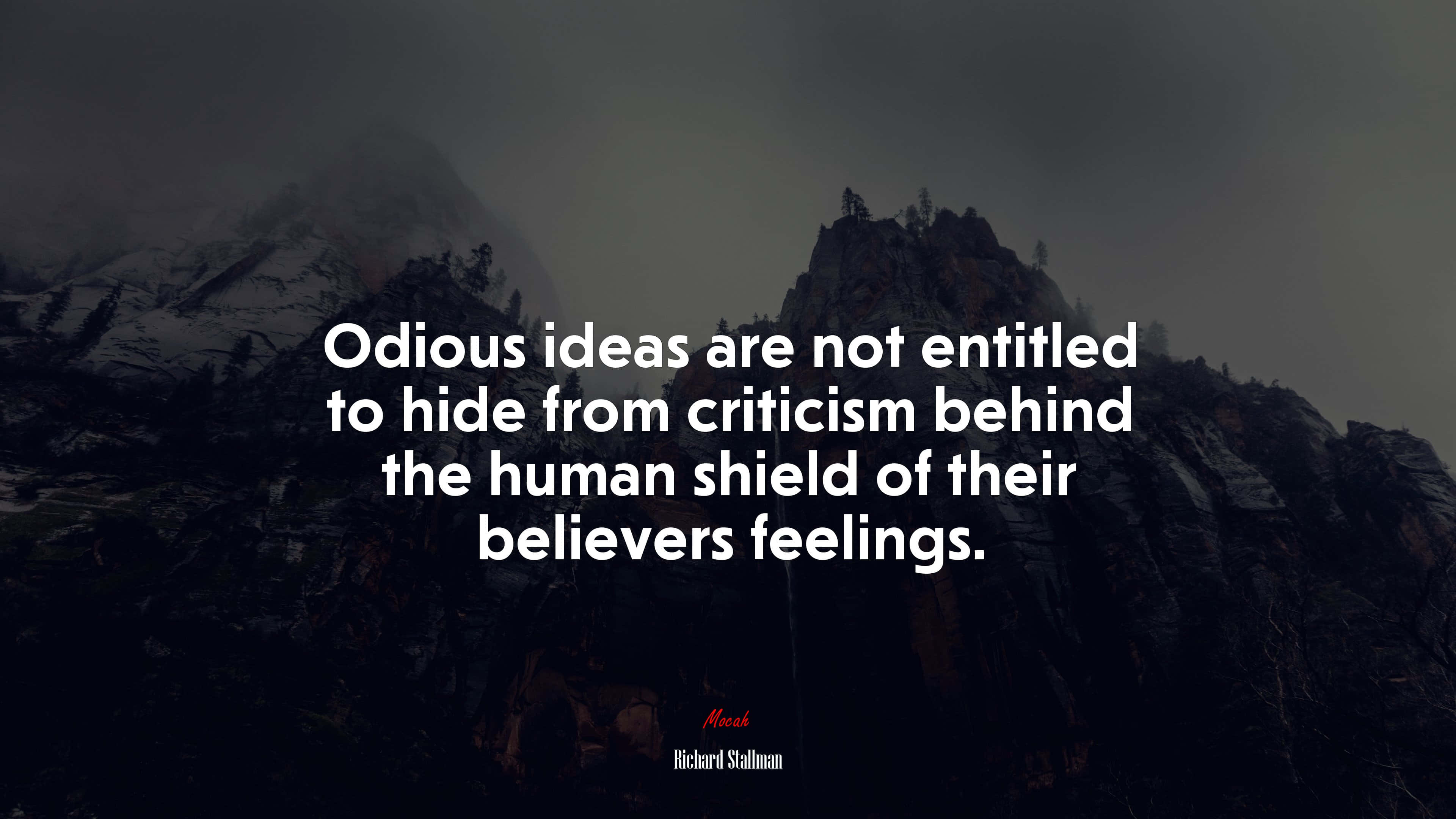Odious 桌布 壁紙 — 黑暗的山峰籠罩在迷霧中，一句粗體白色引言覆蓋在陰鬱的景觀上。