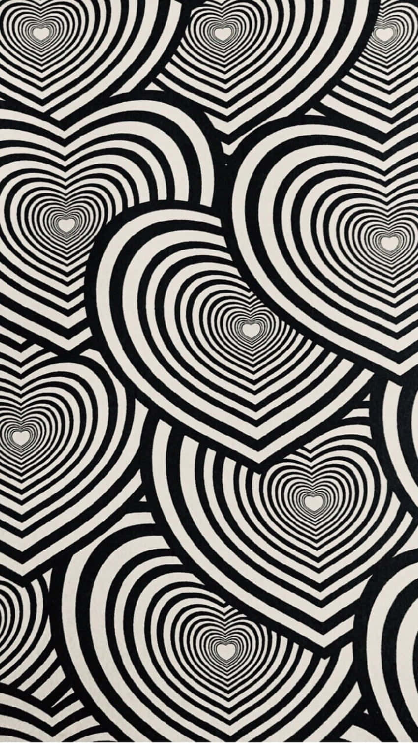 Black And White Heart 桌布 壁紙 — 黑白催眠圖案，重疊的同心心形創造光學錯覺深度。