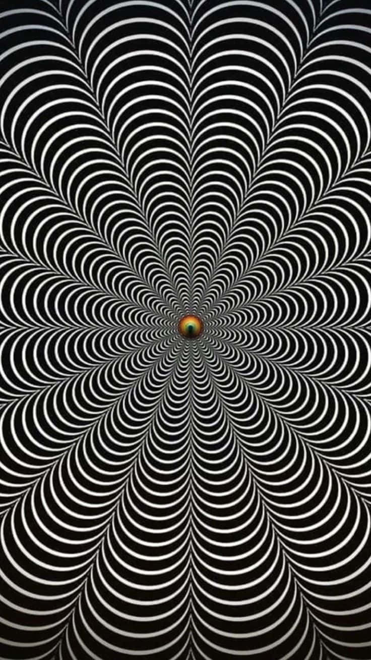 抽象 桌布 壁紙 — 黑白同心圓營造出催眠隧道效果，匯聚到一個微小的彩虹色點上。