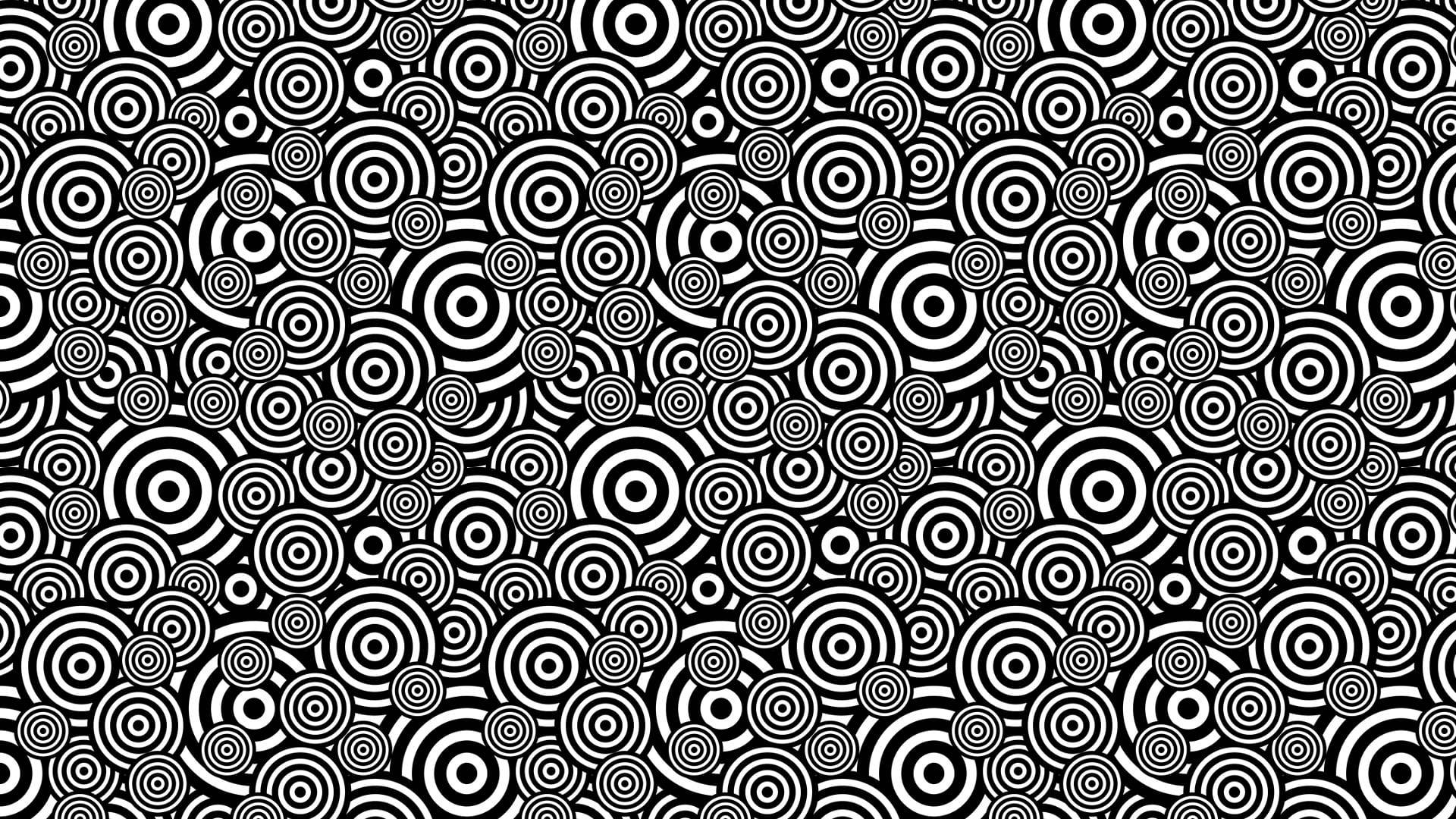 Hypnosis 桌布 壁紙 — 黑白同心圓的密集圖案營造出催眠般的錯視效果。