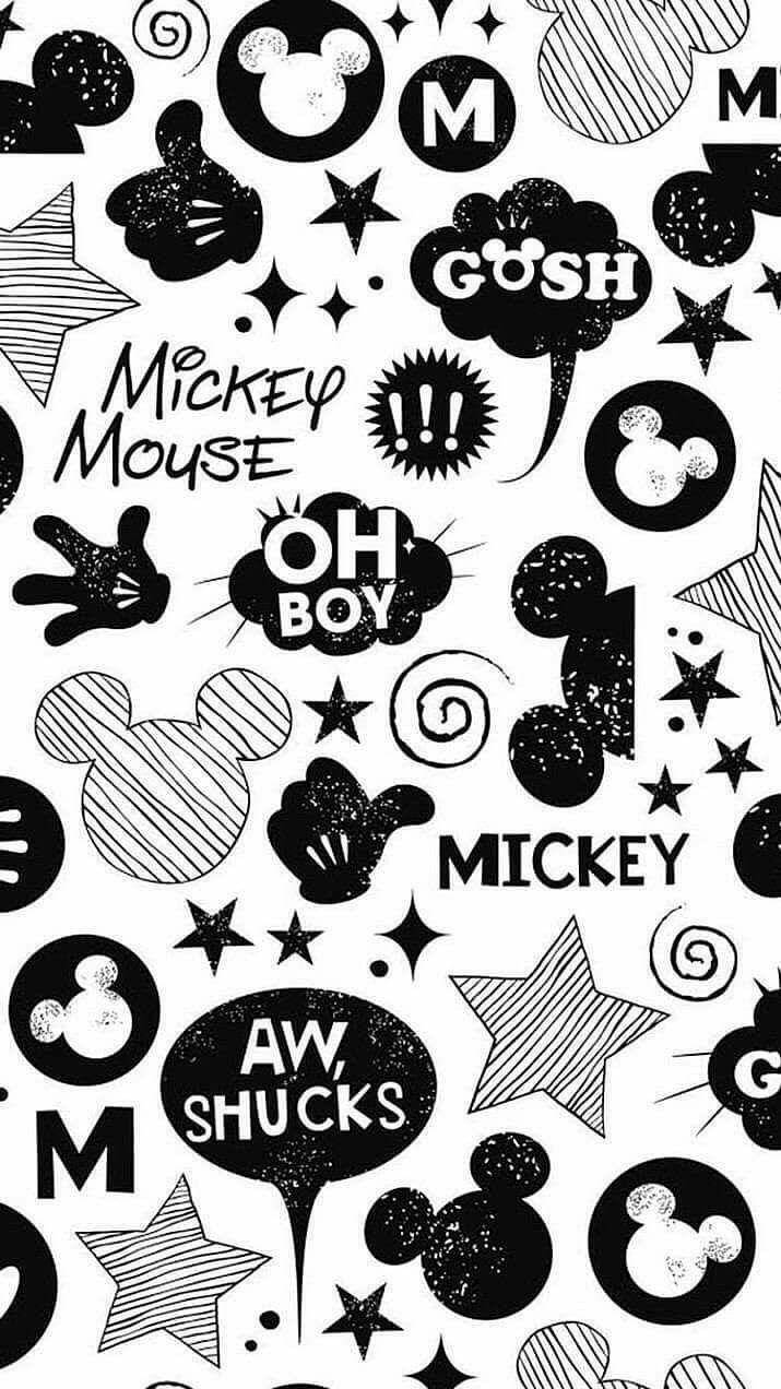 Mickey 桌布 壁紙 — 黑白壁紙，充滿米奇老鼠圖標、對話氣泡和星星，風格玩味復古。