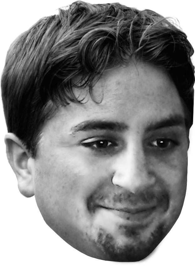 Meme Face 桌布 壁紙 — 黑白特寫肖像，一個微笑的男人，頭髮凌亂，鬍鬚未刮。