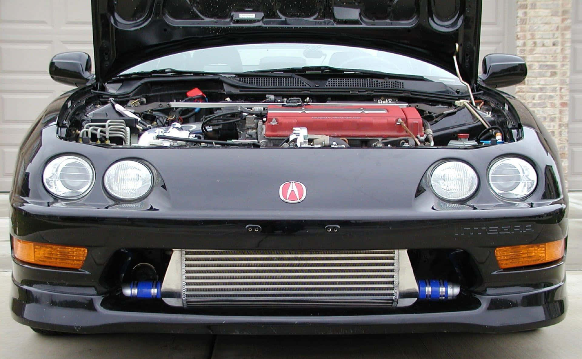 Acura Integra 桌布 壁紙 — 黑色Acura Integra正面視圖，引擎蓋打開，露出紅色引擎和售後市場中冷器。