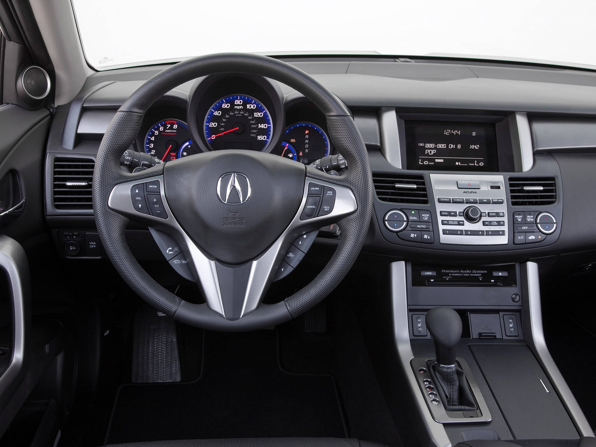 Acura 桌布 壁紙 — 黑色Acura汽車內飾特寫，帶有藍色發光儀表和銀色飾邊。