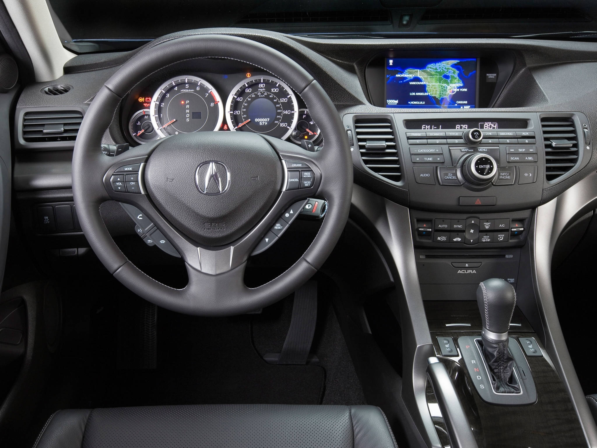 Acura 桌布 壁紙 — 黑色Acura汽車內飾特寫，顯示方向盤、儀表板和變速桿。