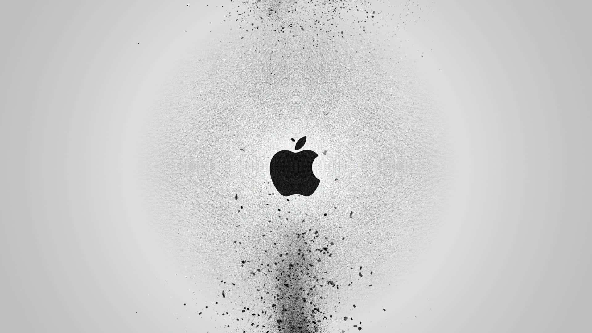 Splatter 桌布 壁紙 — 黑色Apple標誌居中於帶紋理的灰色皮革上，深色粒子從其底部向上散開。